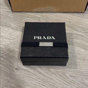 PRADA box and tissue paper and authenticity cards (from bracelet)